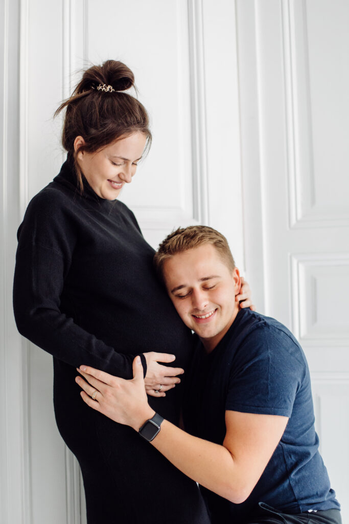 Beautiful pregnancy of young family. Pregnant woman and man. Happy couple, wife and husband