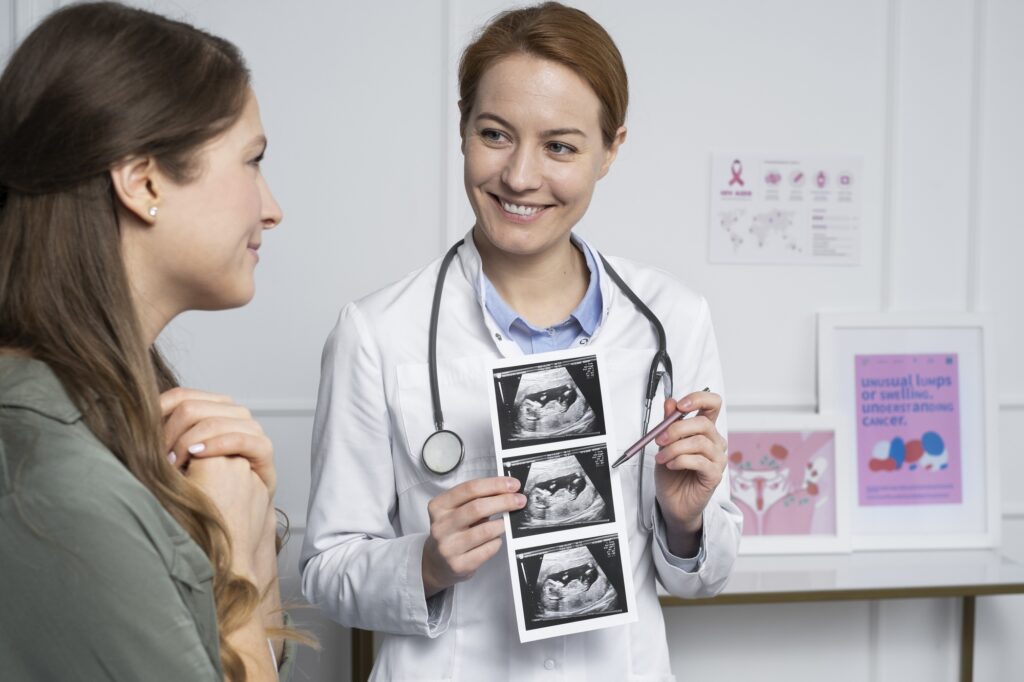 medium-shot-smiley-doctor-explaining-ultrasounds
