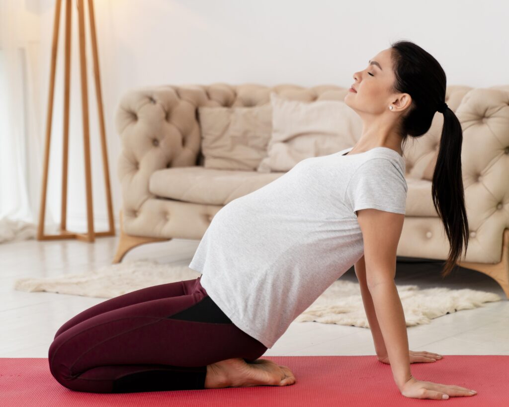 side-view-young-pregnant-woman-exercising-fitness-mat