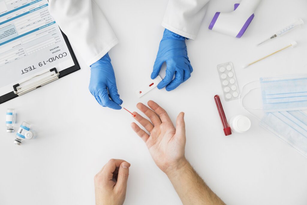 top-view-doctor-doing-covid-test